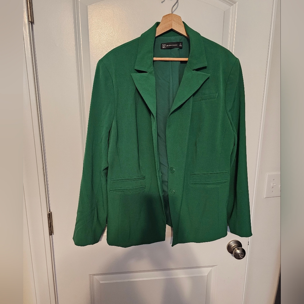 Green blazer never worn Size 20.